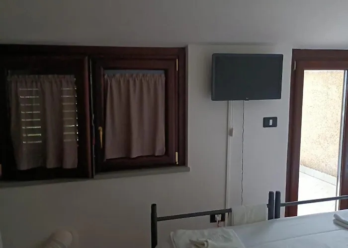 A' Porta I Frustere *